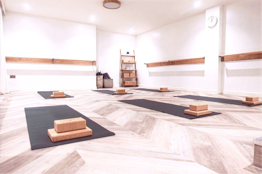 Mats and blocks are laid out neatly  inside The Nooks yoga studio